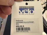 a person holding a card with a picture of a bicycle