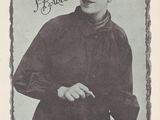 an old picture of a man with a hat and flowers