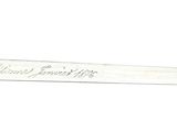 a picture of a pair of scissors with writing on them
