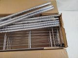 a box with a bunch of pens sitting on top of it