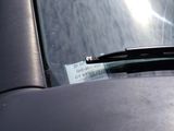 a car windshield with a sticker on the windshield