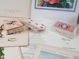 a picture of a collection of cards and other items on a table