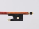 a close up of a violin bow on a white background