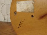 a picture of a wooden clock on a shelf