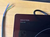 a tablet computer sitting on top of a wooden table