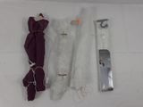three pieces of cloth and a pair of scissors on a table
