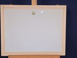 a picture of an easel with a white board on it