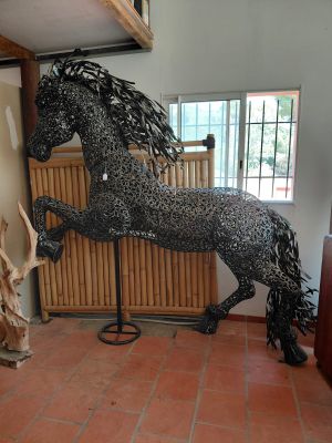 a statue of a horse that is standing on its hind legs