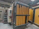 a large machine that is sitting inside of a building