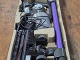 a box of assorted items on a wooden table