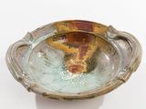 a small bowl that is sitting on a table
