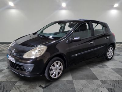 a picture of a black car parked in a garage