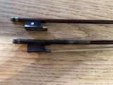 two wooden chopsticks on a wooden table