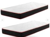 a couple of mattresses that are on top of each other