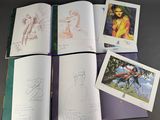 a lot of drawings in this book on the table