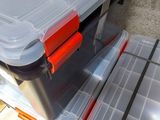a large plastic box with a lid on top of it