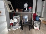 an image of a room with a stove and a chair