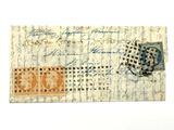 un vieux bout de papier sur lequel figure un timbre