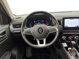 a picture of the interior of a car with a steering wheel and dashboard