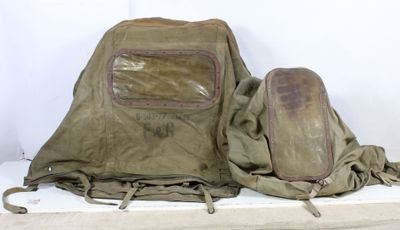 a backpack and a pair of shoes sitting on a shelf