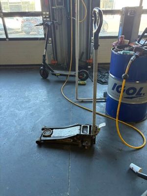 an image of a room with a lot of tools on the floor