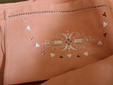 a bag with a design on it sitting on a table