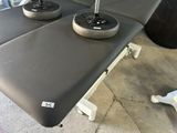 a table that has two wheels on top of it