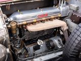 a close up view of a car engine with the hood down