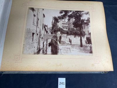 an old photo of a street in a city