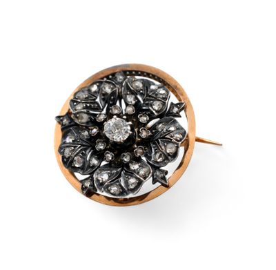 a close up of a black and white diamond ring on a white background