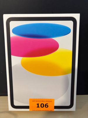un gros plan d'une boîte sur laquelle figure l'image d'un objet coloré