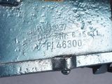 a close up of a piece of metal with writing on it