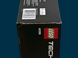 a black box with a red and white logo on it