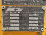 a close up of a sign on the side of a machine