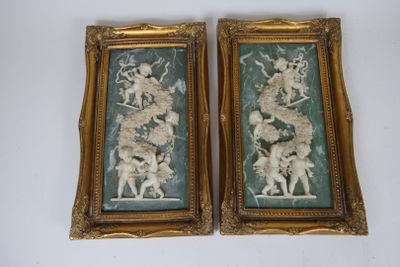 pair of antique carved picture frames of a man and woman on horseback