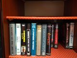 a book shelf with many different books on it