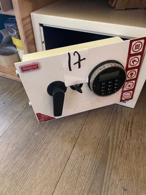 a safe box that has a digital clock inside of it