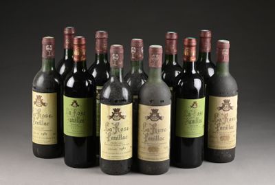 six bouteilles de vin sont alignées sur une table