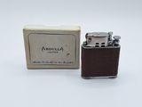 a small lighter that is sitting in front of a box