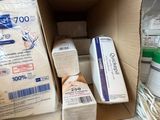 a cardboard box with a lot of toilet paper in it