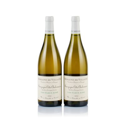 two bottles of white wine sitting next to each other on a white surface