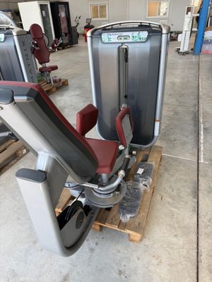 a gym machine that is sitting on a pallet in a warehouse