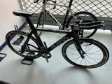 a bike that is sitting on a table in a room