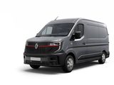 Une camionnette grise est garée sur une surface blanche.