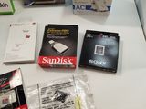 many different types of electronic devices on the table