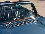 a close up of a car ' s windshield with a sticker on it