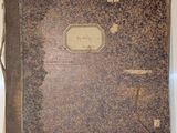 an old book that is sitting on a table