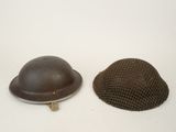two helmets that are sitting on a white surface