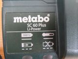 a close up of a battery charger on a table