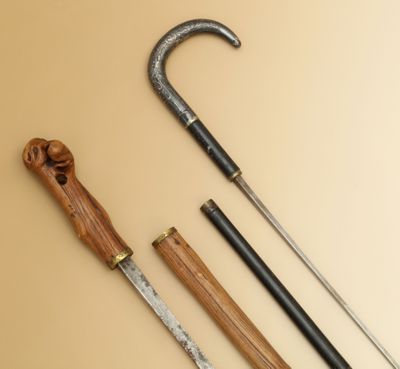 2 CANNES à système "Epée" - L'une en bois noueux - Photo 1